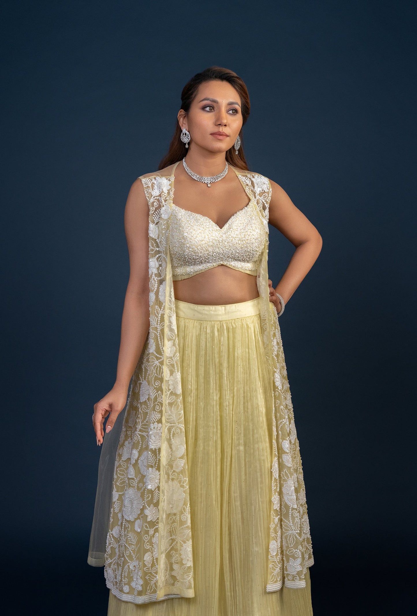 Irene Three piece Pastel Yellow Embroidered Lehenga Set