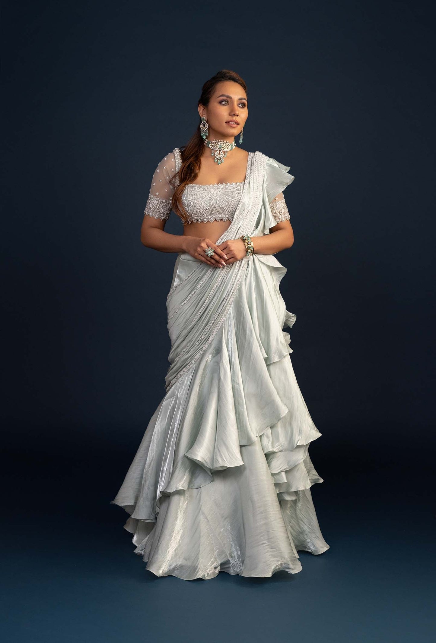 Demure Pastel Green with Ruffled Gabana silk Pre Draped dupatta Lehenga Set