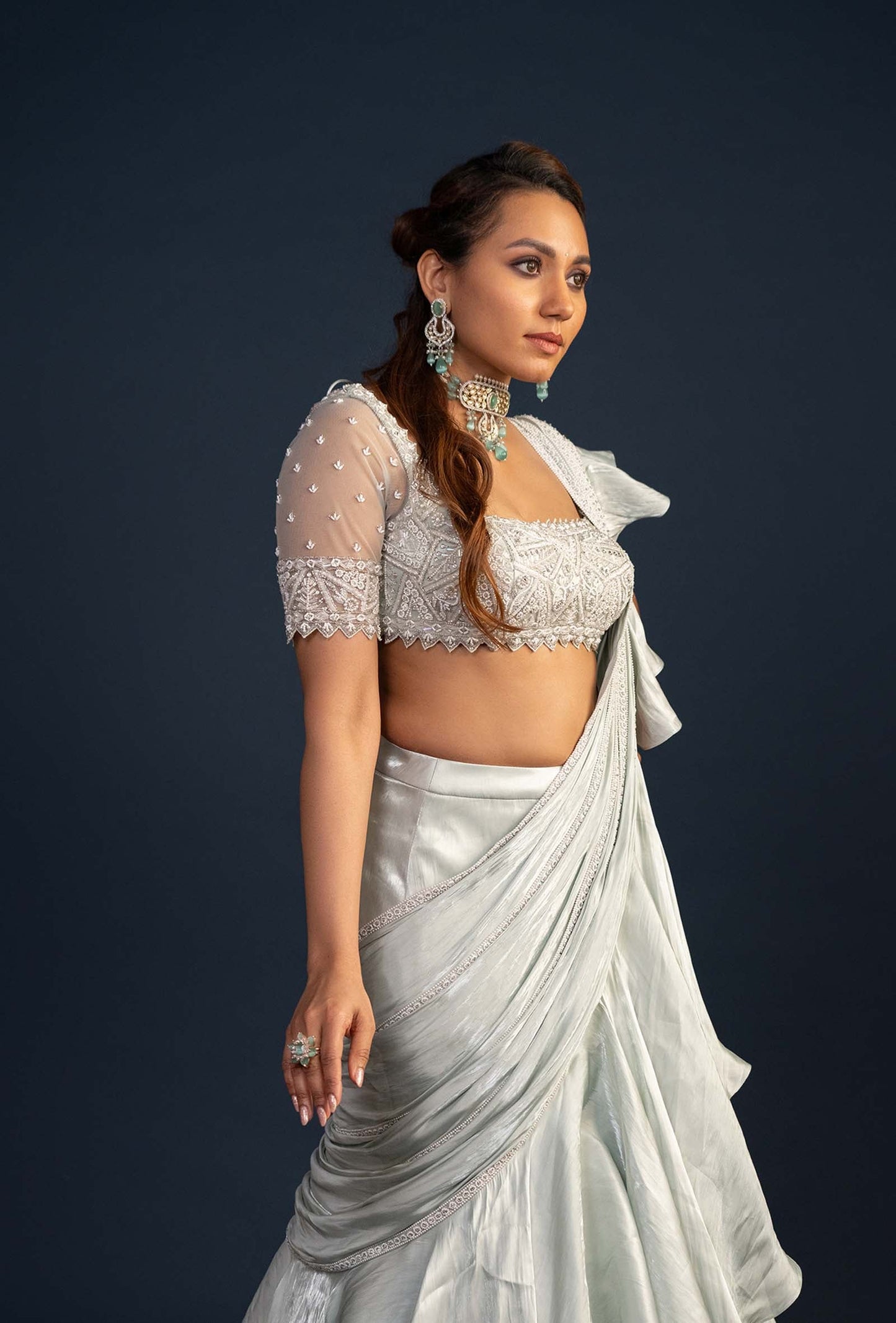 Demure Pastel Green with Ruffled Gabana silk Pre Draped dupatta Lehenga Set