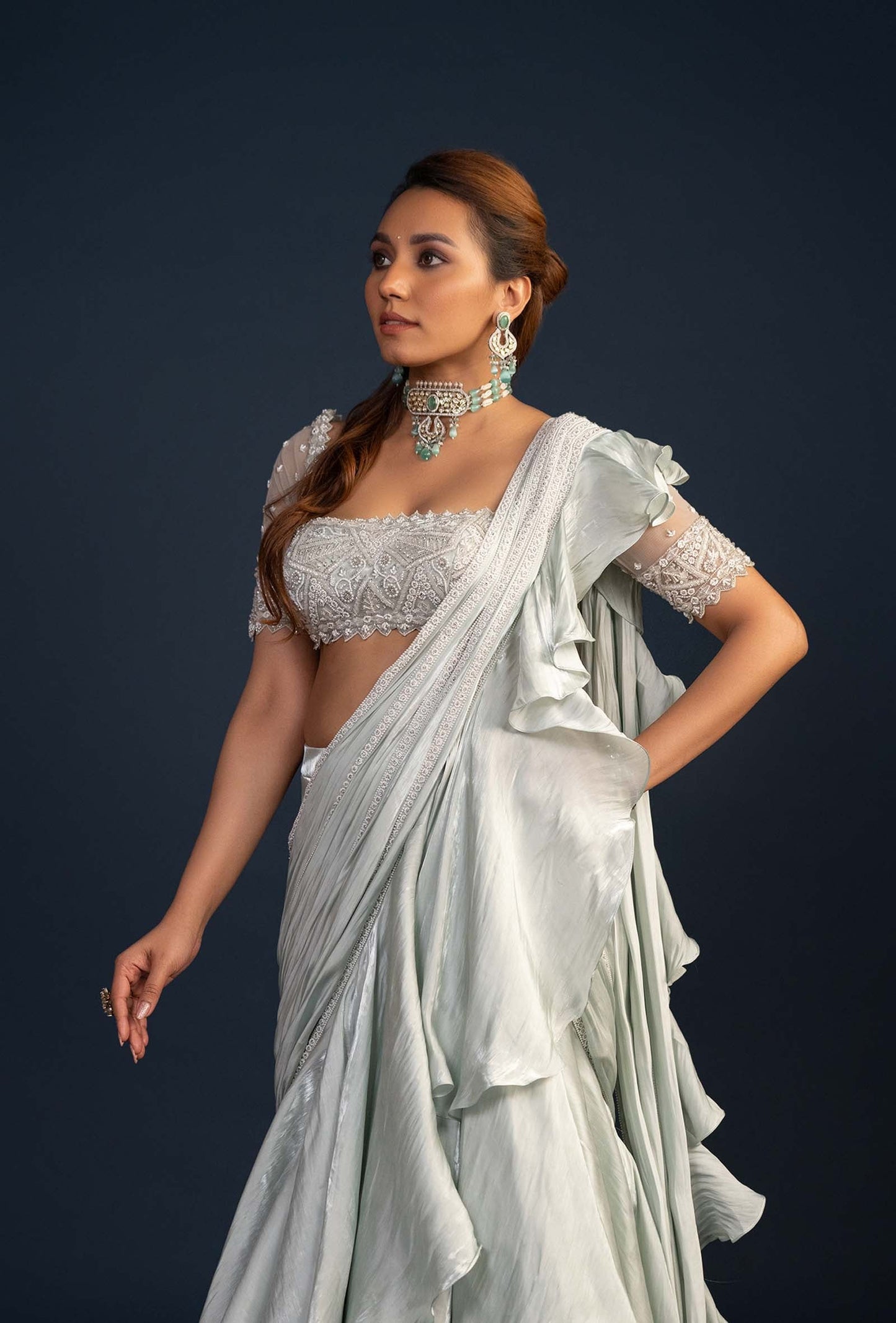 Demure Pastel Green with Ruffled Gabana silk Pre Draped dupatta Lehenga Set